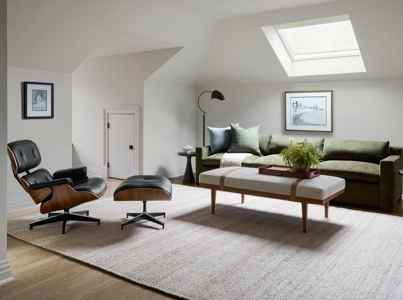 Completed Summit home office seating area beneath a skylight.