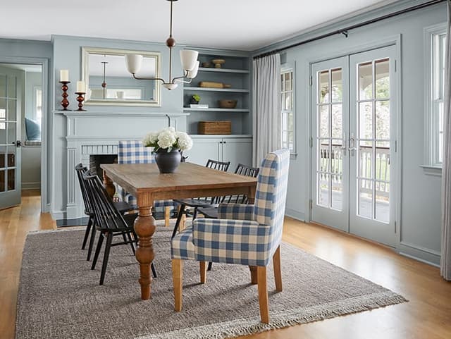 Dining room with modern farmhouse detailing in a whole-home renovation and addition in Westfield, NJ, by Michael Robert Construction